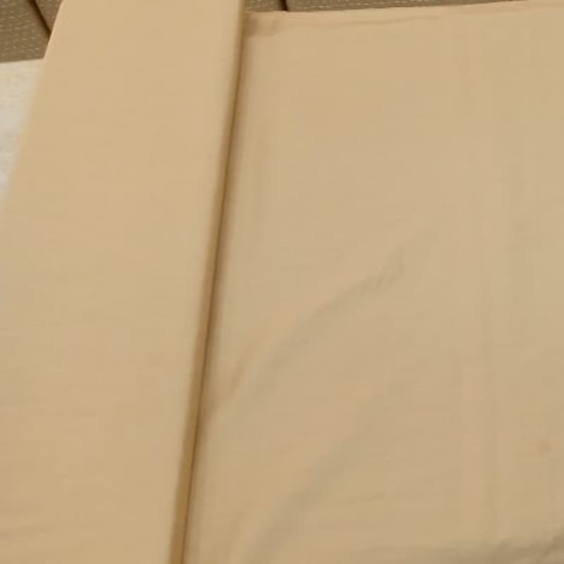 Unstiched cotton fabric available in yellow colour